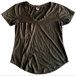 Really soft dark evergreen. Very comfortable. Little pocket on right chest.
